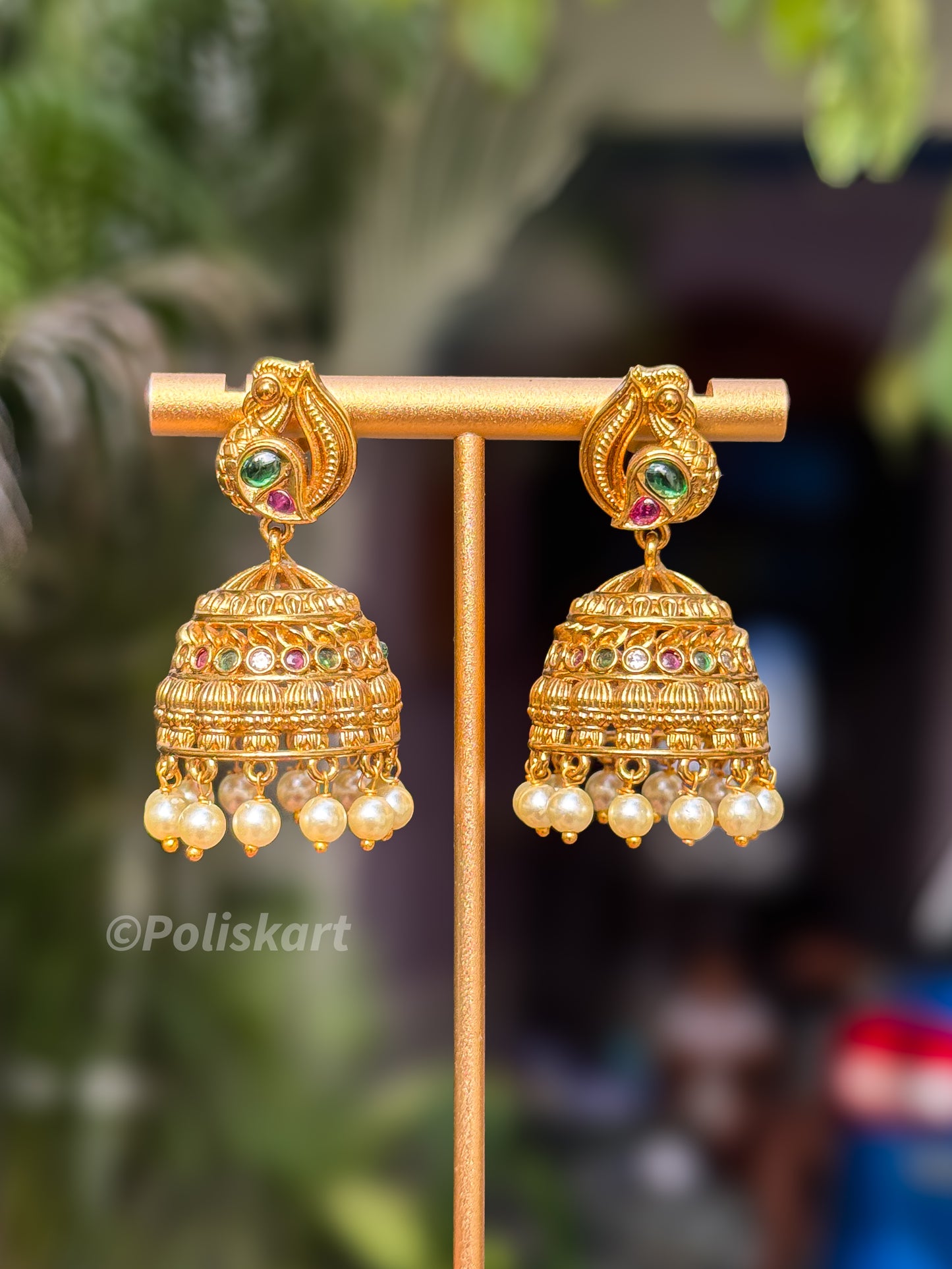 Simple green and ruby stone worked jhumka set