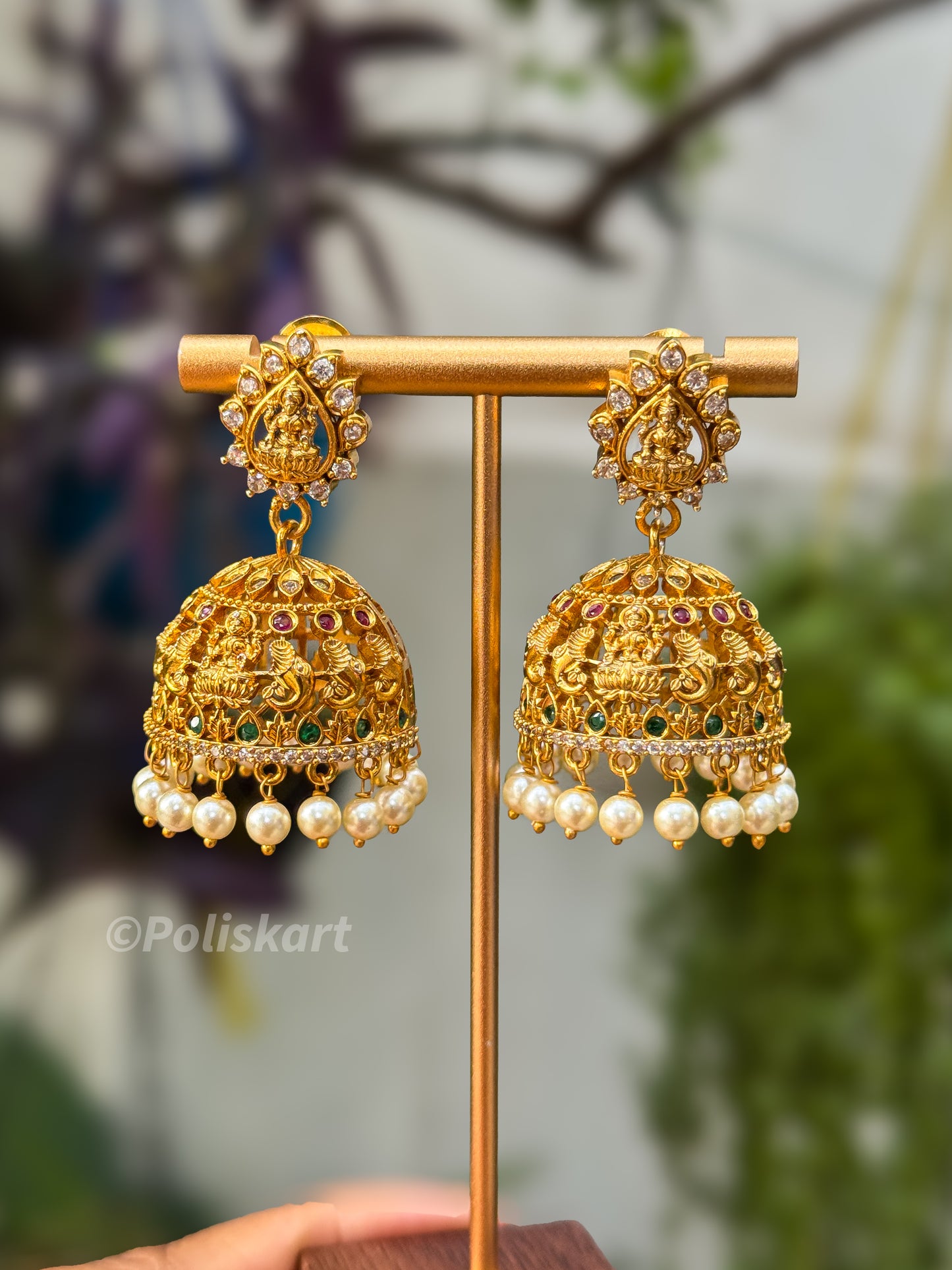White stone worked lakshmi pearl jhumka set