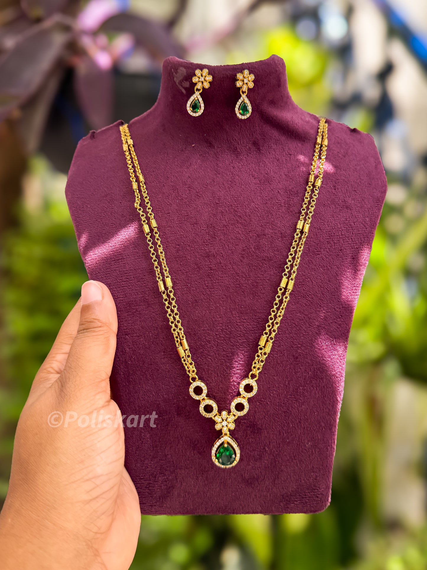 Double chain with green stone worked pendant and earing set