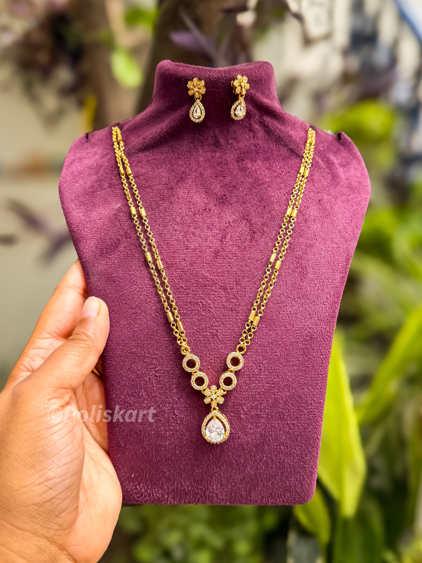 Double chain with white stone pendant and earing