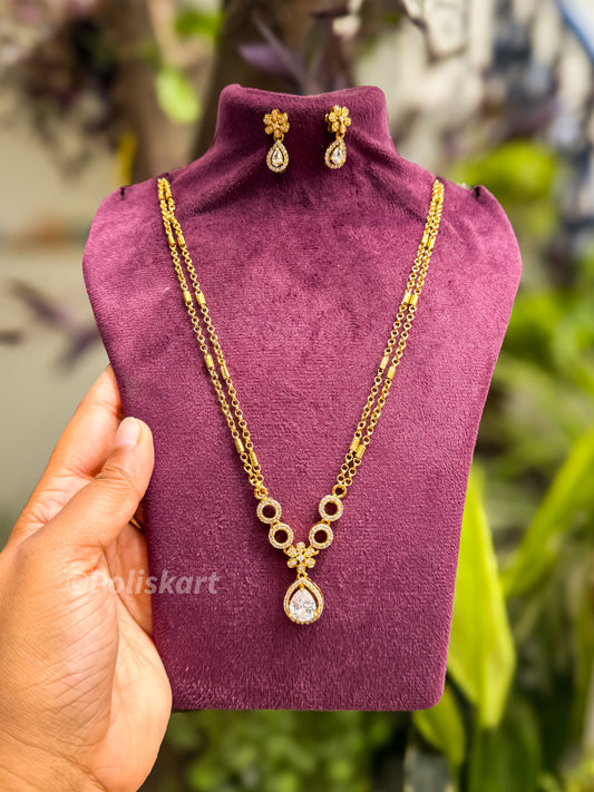 Double chain with white stone pendant and earing