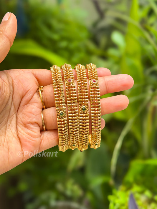 4 bangles with rubi and green stone worked net design `