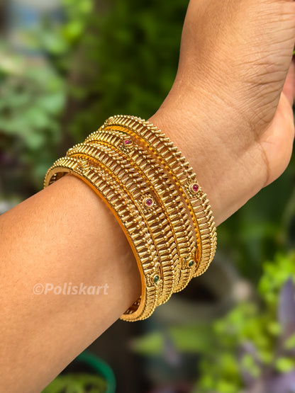 4 bangles with rubi and green stone worked net design `