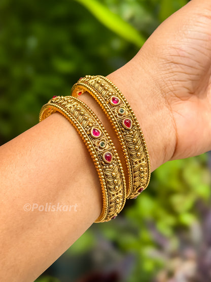 2 bangles with rubi stone worked design `