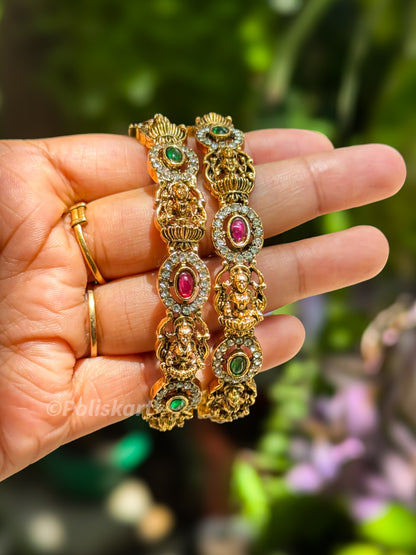 2 bangles with stone and lakshmi worked design `