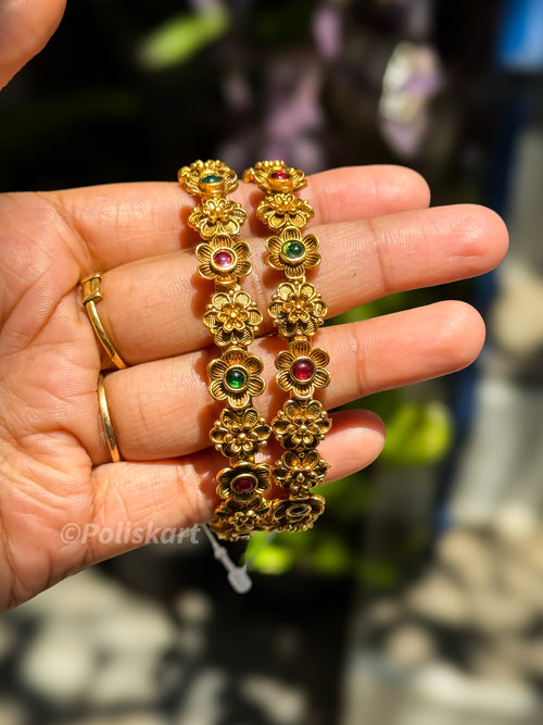 Pair of bangles Flower and stone worked Design