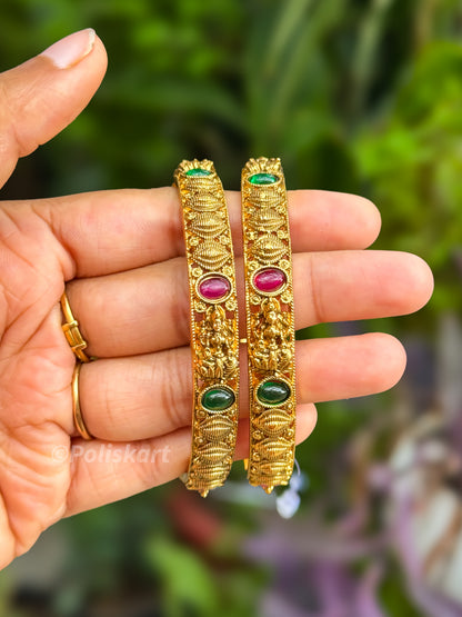 Pair of bangles Lakshmi and stone worked design