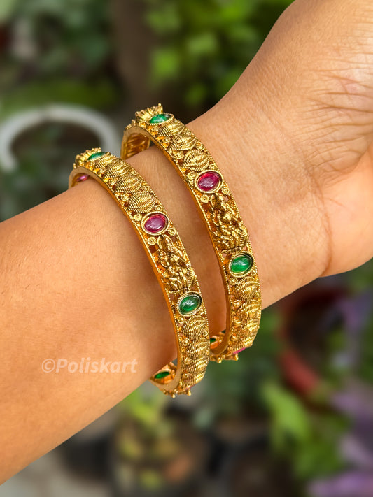 Pair of bangles Lakshmi and stone worked design