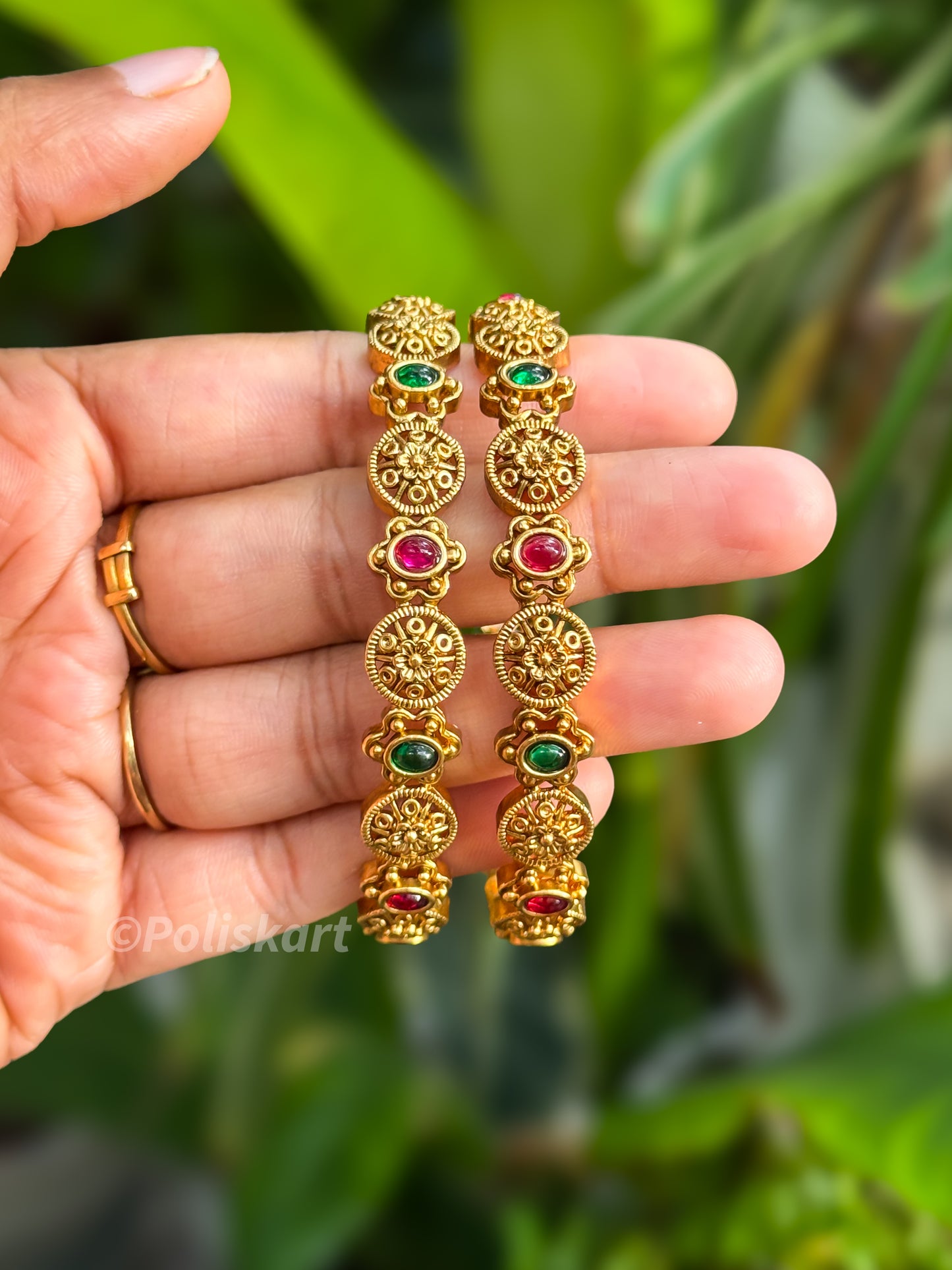 Pair of bangles Chakra and stone worked Design
