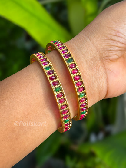 Pair of bangles Fully Ruby and Green stone worked Design
