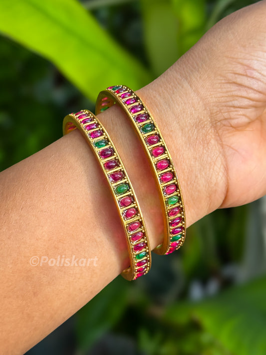 Pair of bangles Fully Ruby and Green stone worked Design