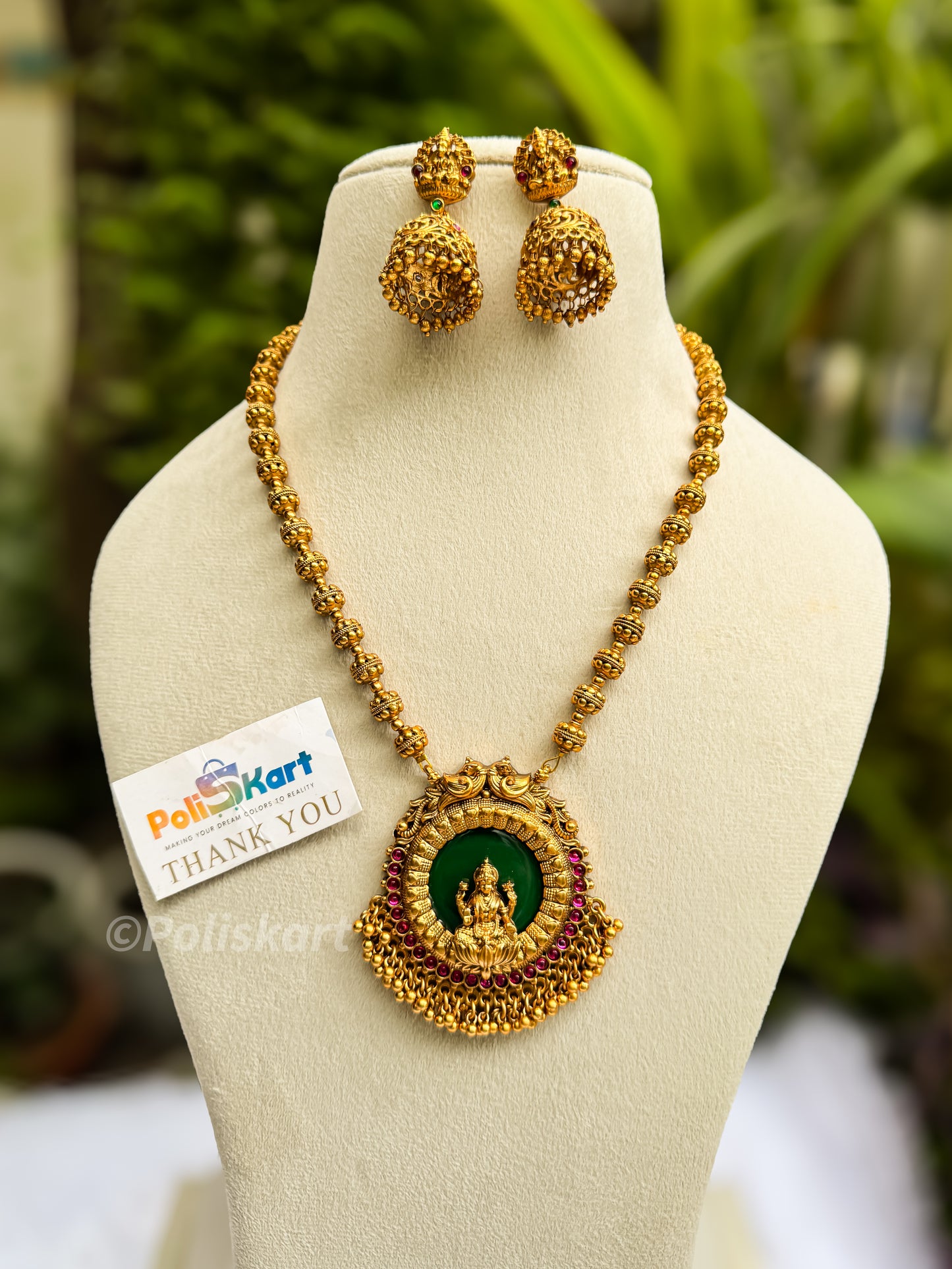 Green highlighted Lakshmi haram with jhumka set