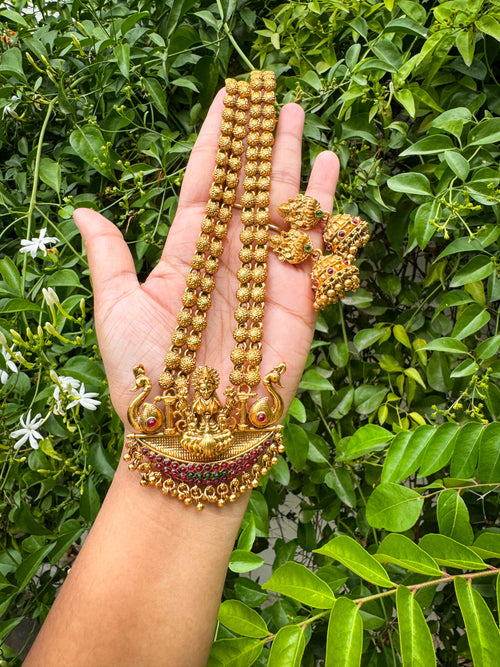Antique Haram with lakshmi detailed Stone worked Locket with a pair of Jhumka