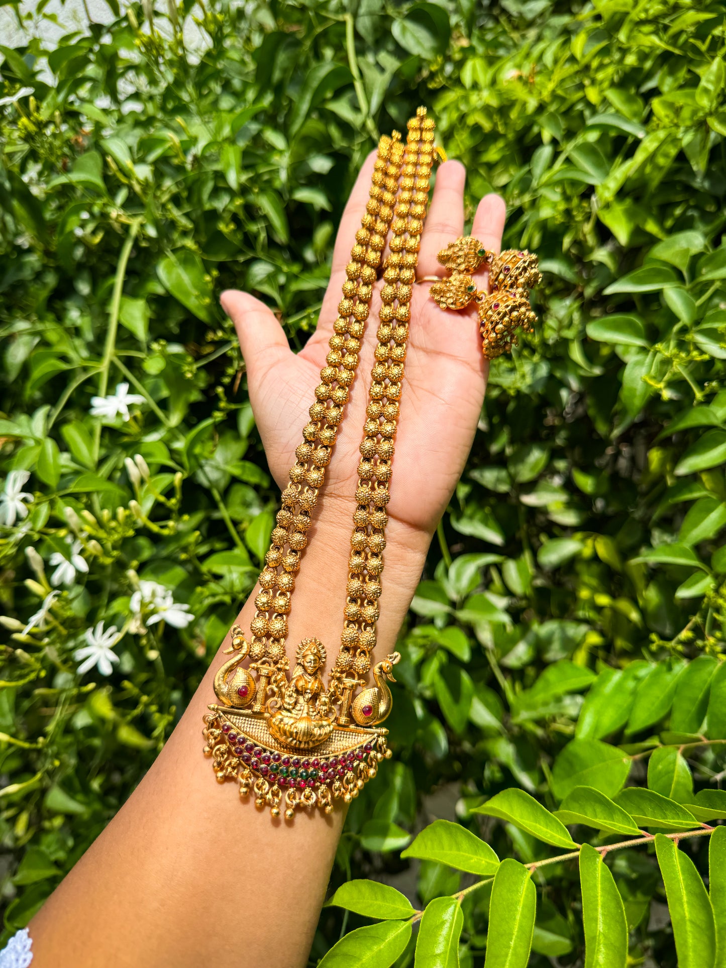 Antique Haram with lakshmi detailed Stone worked Locket with a pair of Jhumka