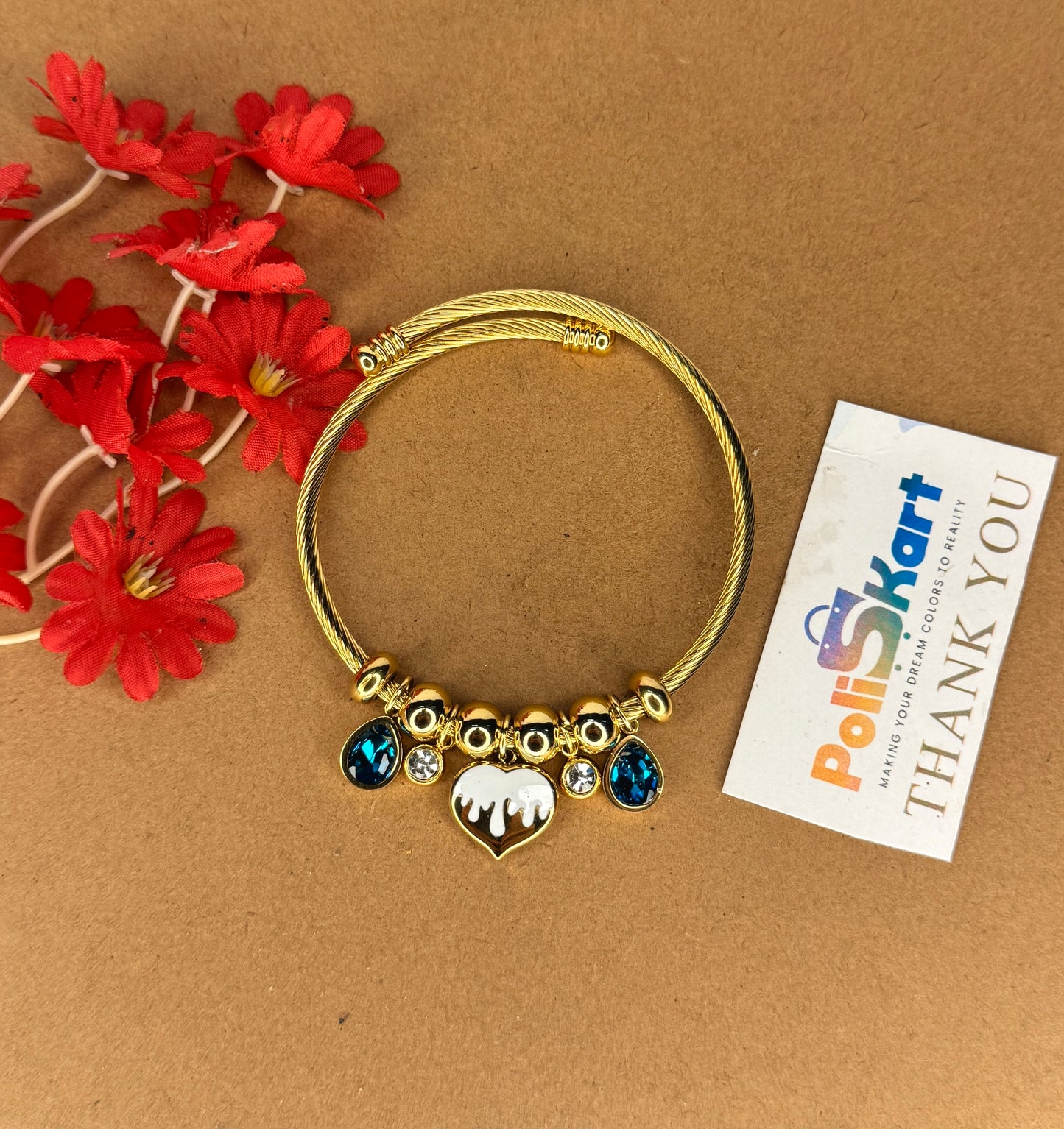 Adjustable bracelet bangle with heart and blue stone hangings