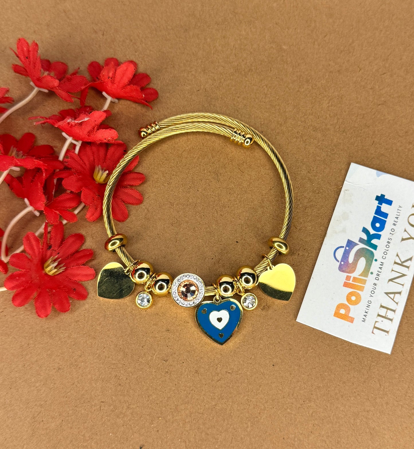 Adjustable bracelet bangle with multiple heart stone hangings