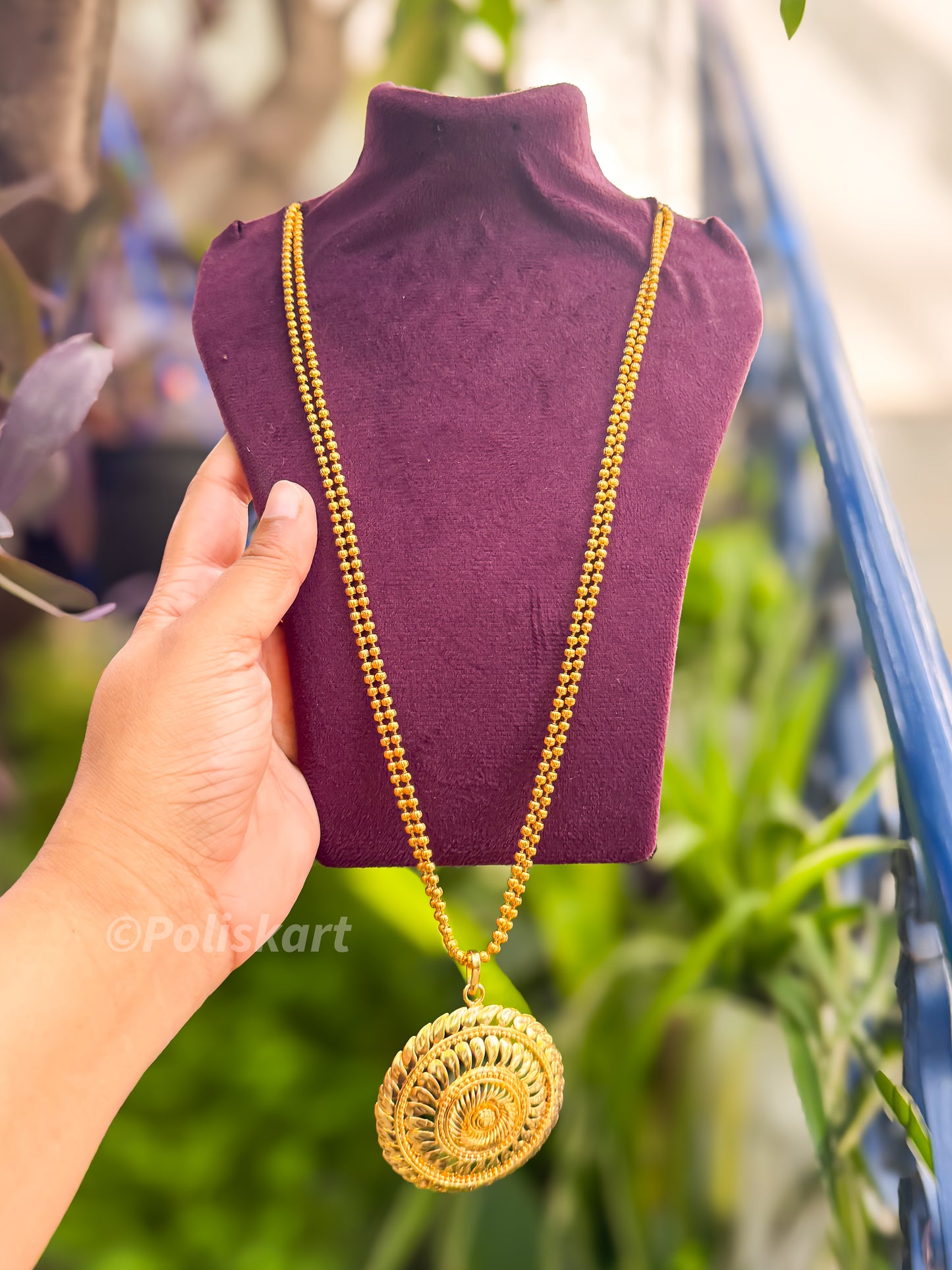 Long chain with gold finished pendant