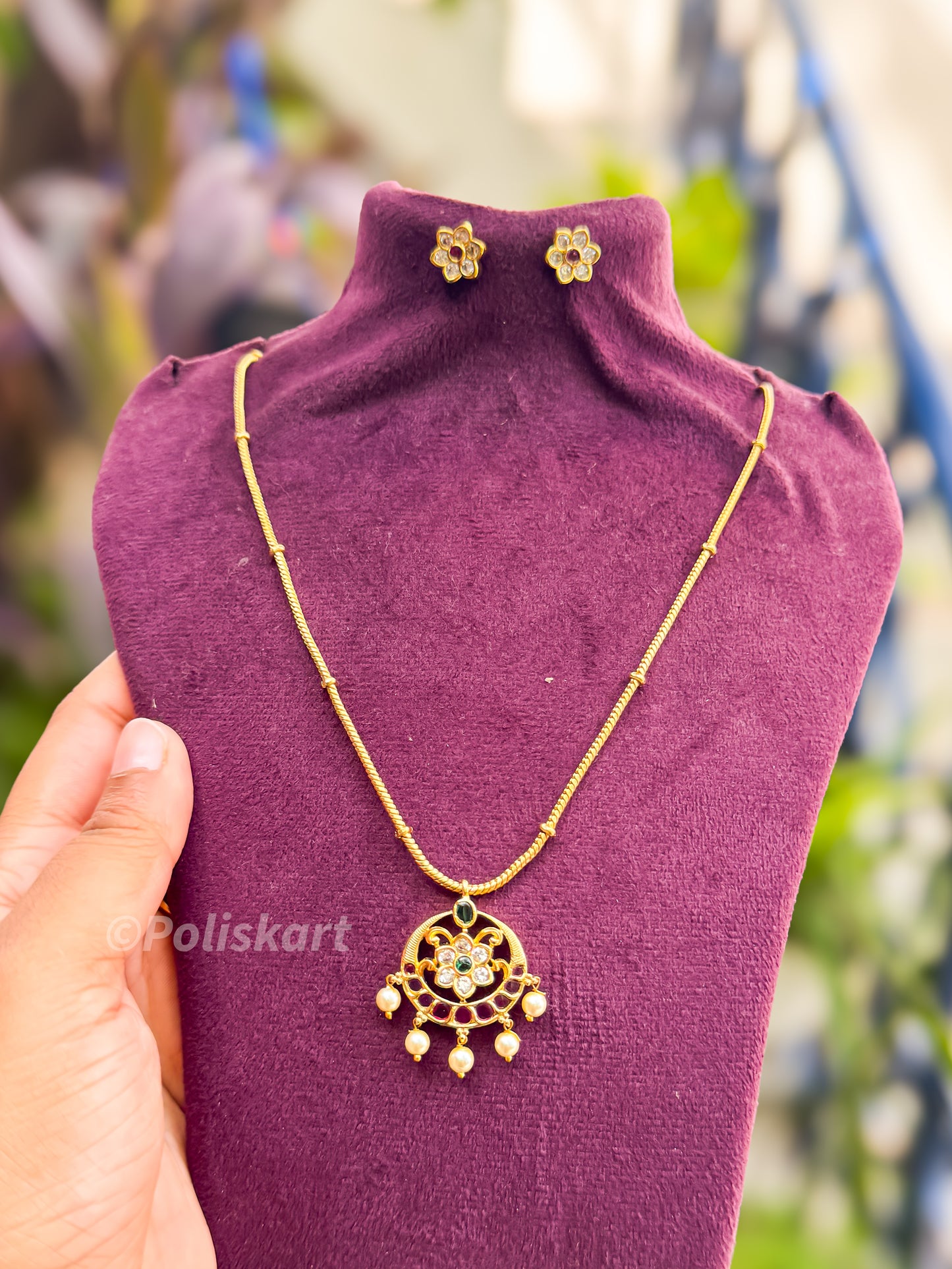chain with stone worked pendent and earing set