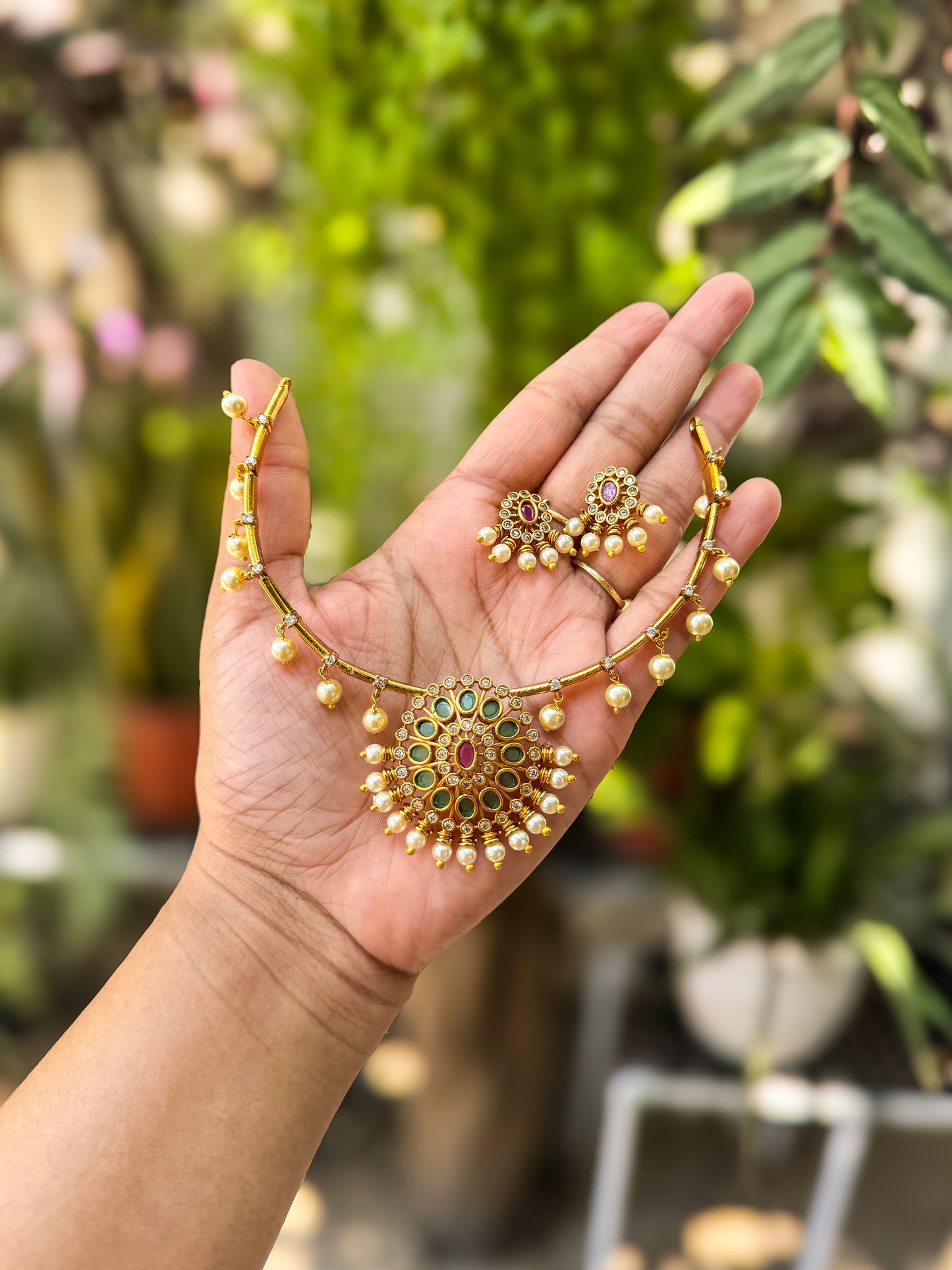 Stone and pearl worked attigai with earring set