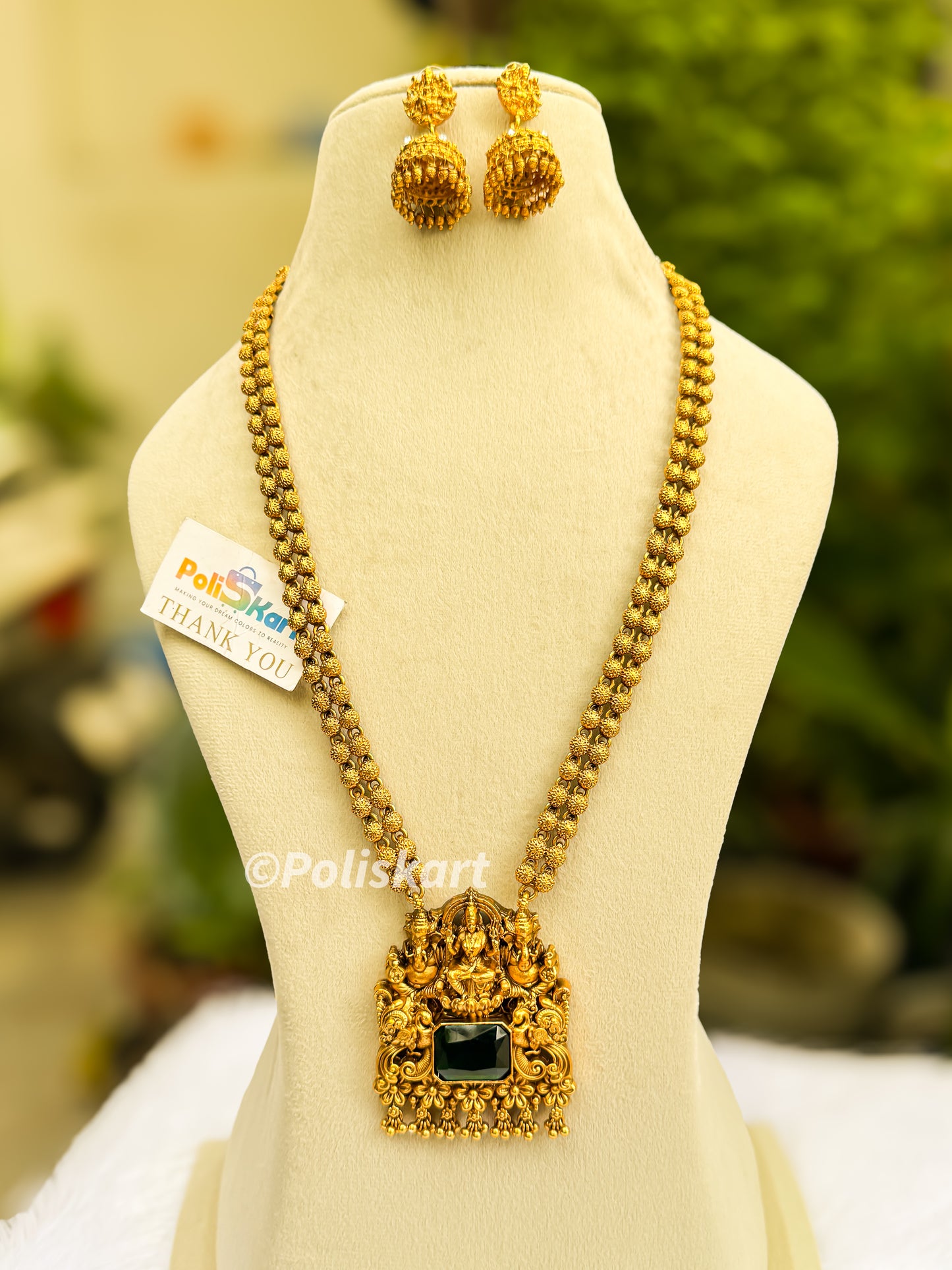 Emaralad stone worked lakshmi haram with jhumka set