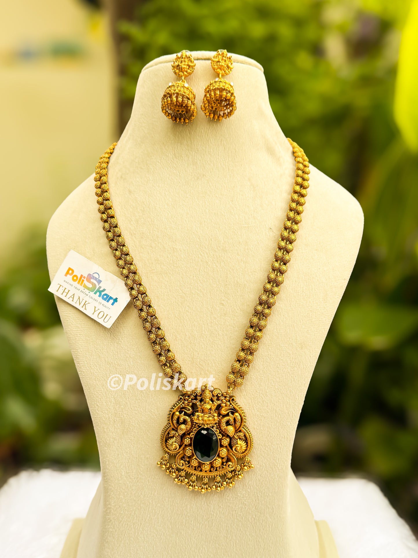 Emaralad single stone lakshmi haram with jhumka set