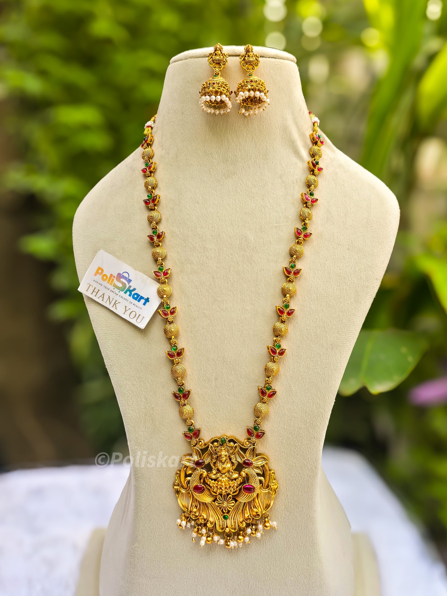 Multi stone worked long Lakshmi haram with earing set