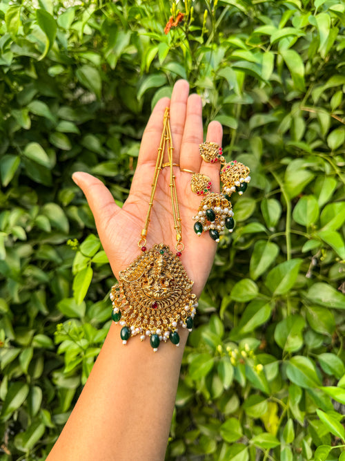 Kerala style rubi green with pearl detailed lakshmi necklace set