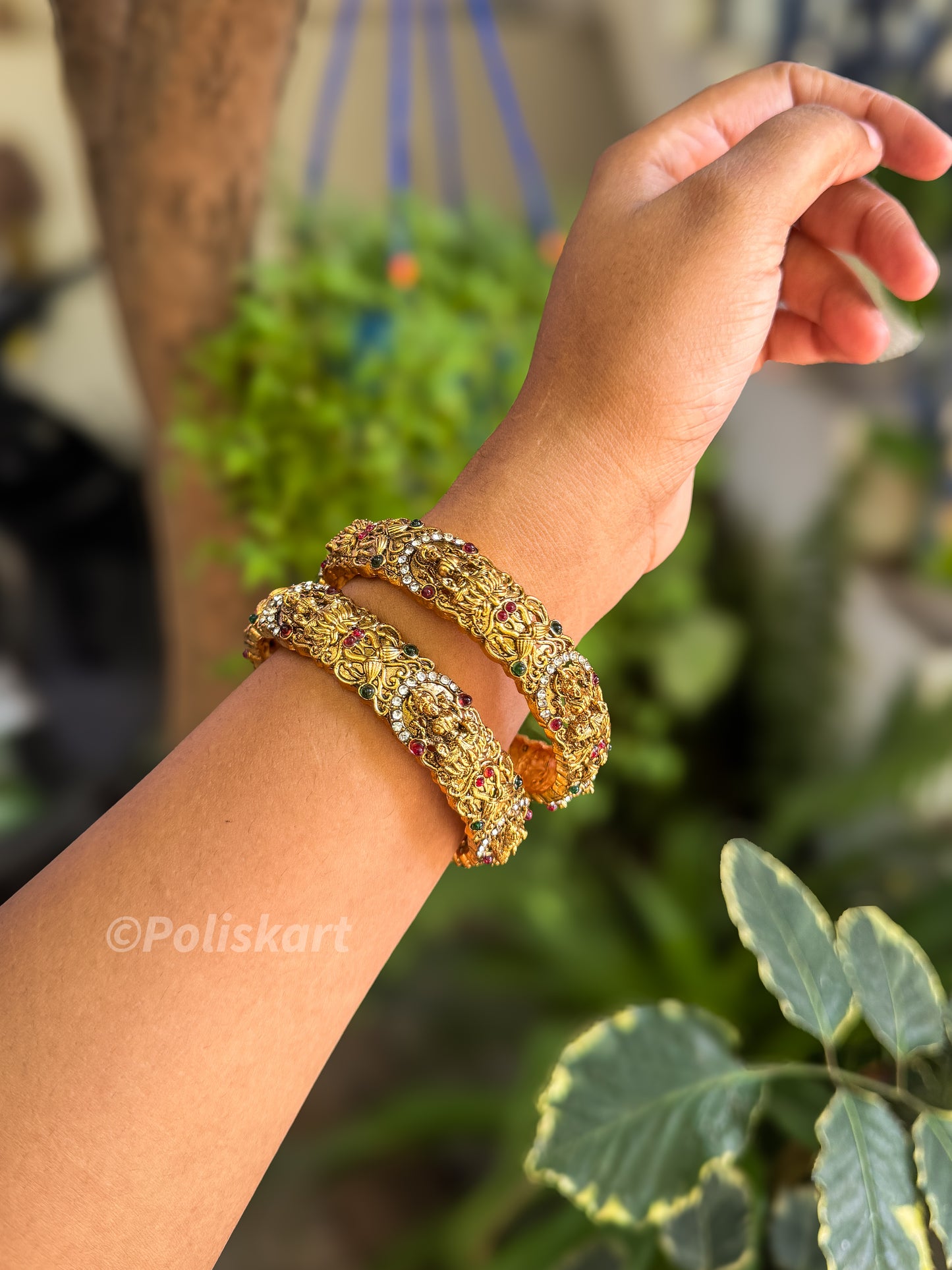 Pair of Lakshmi and stone worked bangles