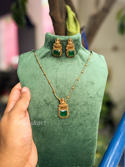 Simple single green stone lakshmi pendant with chain and earring set