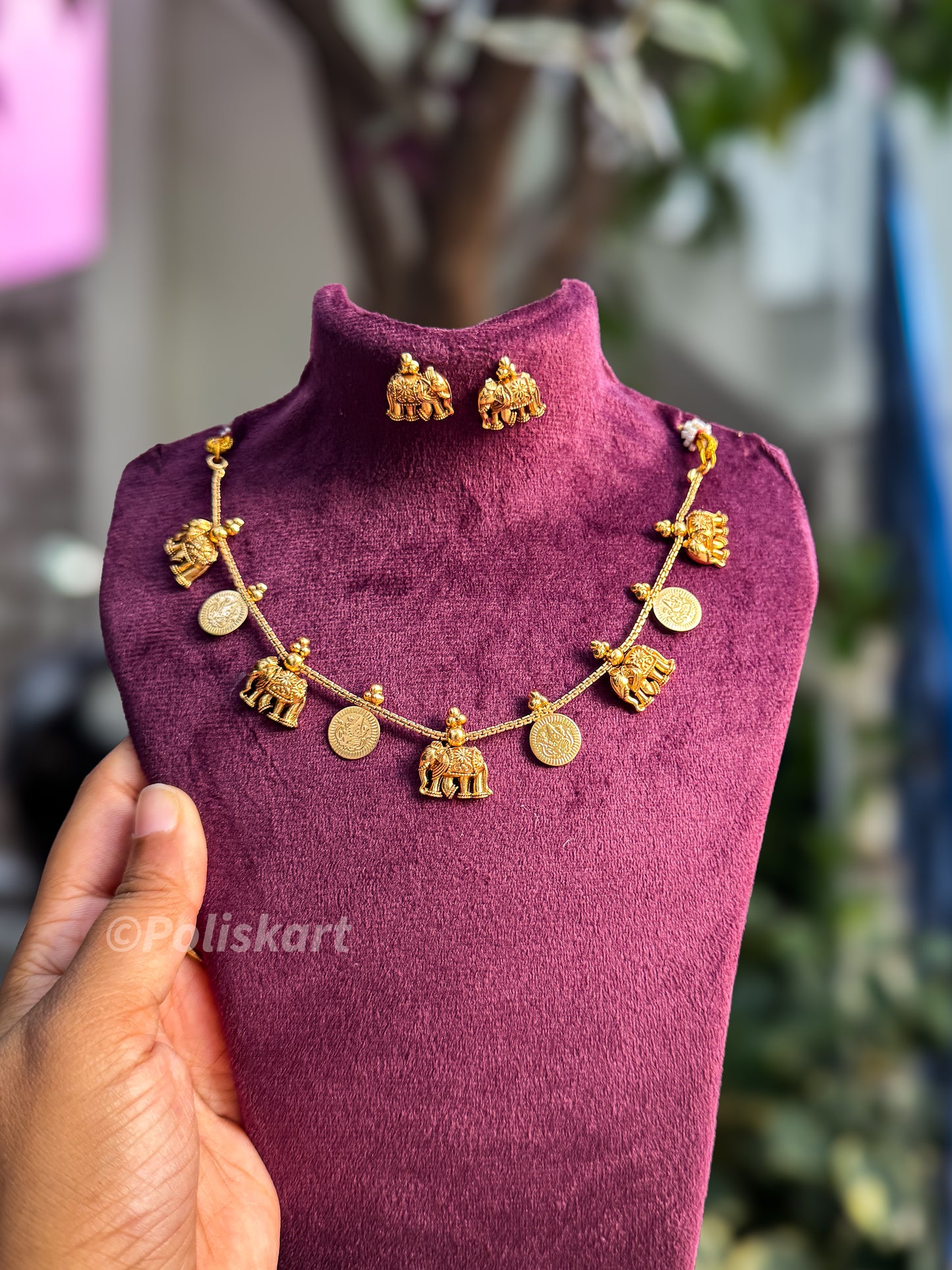 Kasumala and elephant worked necklace with earring